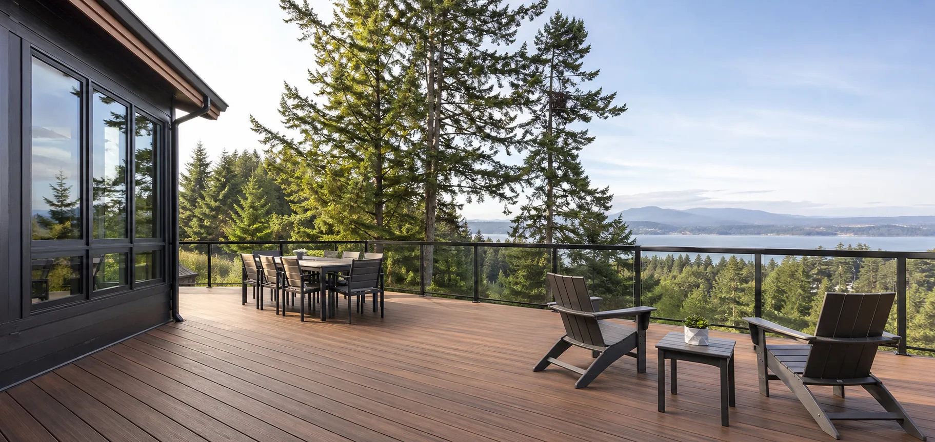 Finished Pacific Northwest deck with clean railings, stairs, and contractor-grade detailing